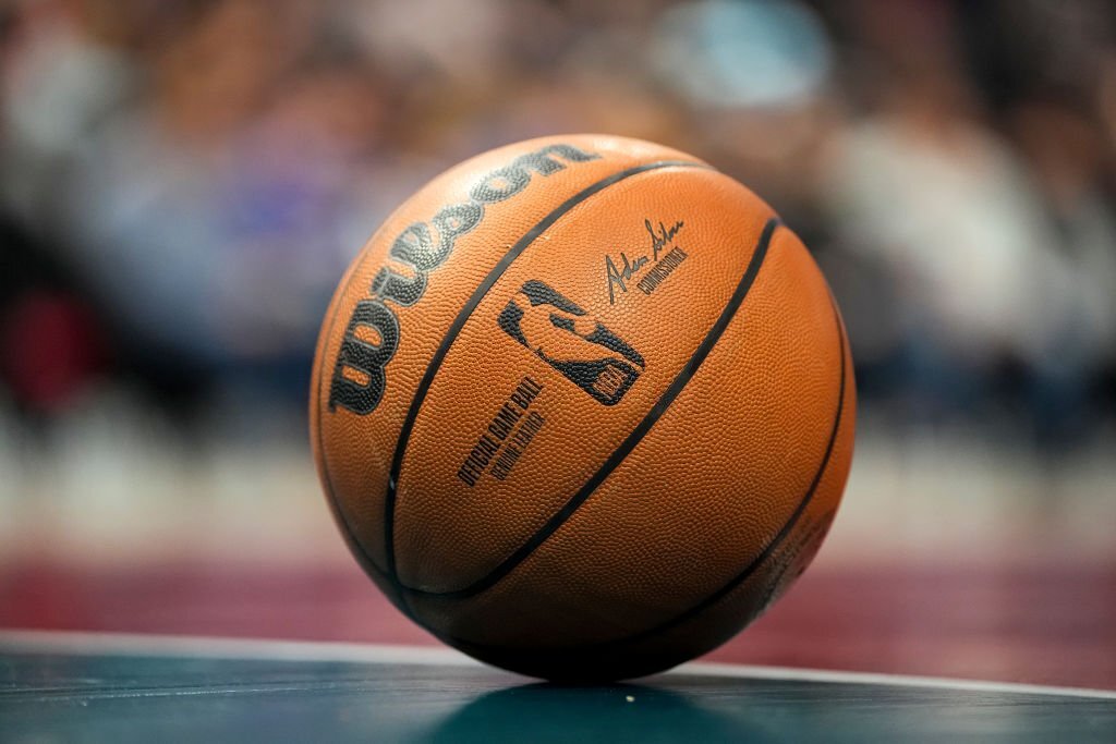A Wilson brand official game ball basketball is pictured with the NBA logo during the game between the Detroit Pistons and Charlotte Hornets at Little Caesars Arena on February 03, 2023 in Detroit, Michigan. 