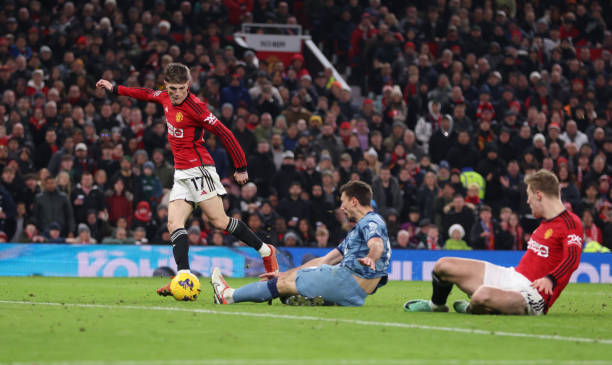 Alejandro Garnacho scores for Manchester United in the Aston Villa vs Manchester United premier league match at Old Trafford on December 26, 2023.