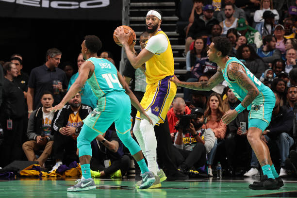 Anthony Davis of the Lakers handles the ball during the game against the Charlotte Hornets on February 5, 2024 at Spectrum Center in Charlotte, North Carolina.