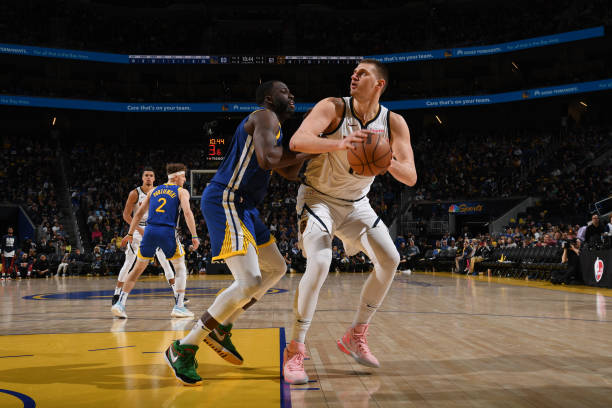Nikola Jokic of the Nuggets attempts a shot during the game against the Warriors on February 25, 2024 at Chase Center in San Francisco, California. 