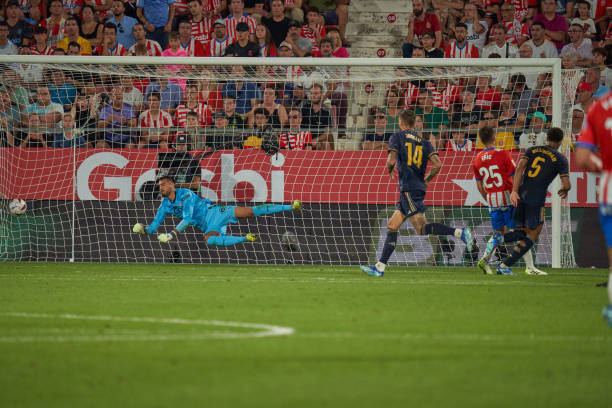 Jude Bellingham of Real Madrid scores the third goal in the Real Madrid vs Girona La Liga match.