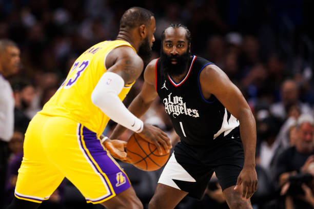 James Harden defends LeBron James during the Clippers vs Lakers game on February 28, 2024 at Crypto.com Arena.
