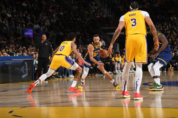 Steph Curry of the Warriors dribbles the ball in the game against the Lakers at Chase Center in San Francisco on February 22, 2024.