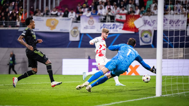 Timo Werner scores against Thibout Courtois in RB Leipzig vs Real Madrid UEFA Champions League match on October 25, 2022. 