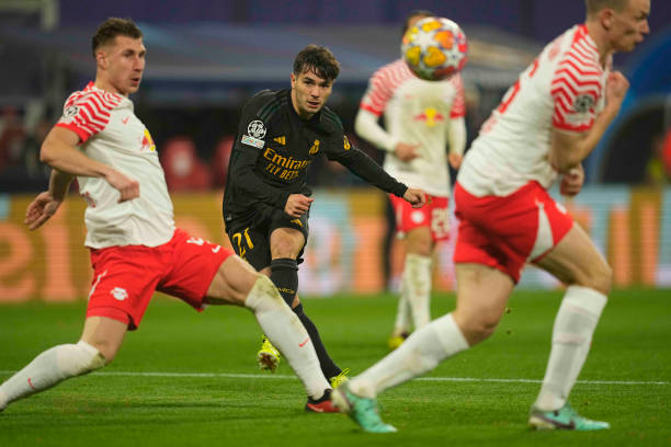 Brahim Díaz scores during the Real Madrid vs RB Leipzig Champions League round of 16 first leg match at the Red Bull Arena.