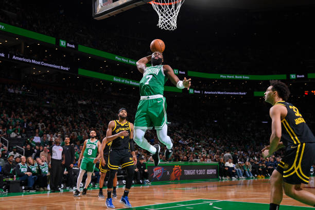 Jaylen Brown of the Boston Celtics dunks the ball during the game against the Warriors at the TD Garden.