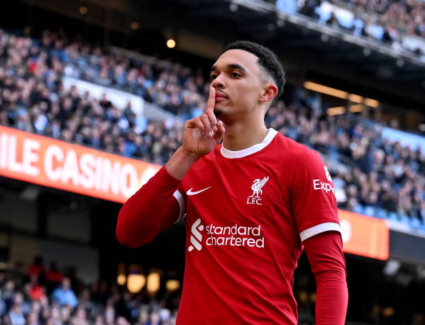 Trent Alexander-Arnold celebrates after scoring the equalising goal during the Liverpool vs Manchester City Premier League match at Etihad Stadium.