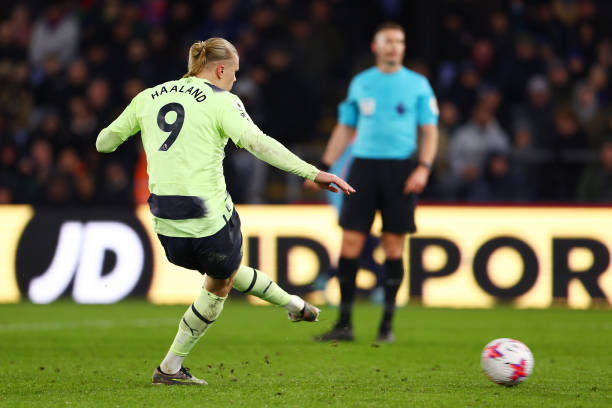 Erling Haaland scores from the penalty spot during the Crystal Palace vs Manchester City Premier League match at Selhurst Park on March 11, 2023. Man City won 1-0.