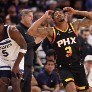 Bradley Beal of the Phoenix Suns reacts after fouling out against Anthony Edwards of the Timberwolves during the second half of game four of the Western Conference First Round Playoffs at Footprint Center. The Timberwolves defeated the Suns 122-116 and win the series 4-0.
