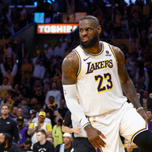 LeBron James of the Lakers after making a slam dunk against the Denver Nuggets in the second half during game four of the Western Conference First Round Playoffs at Crypto.com Arena.