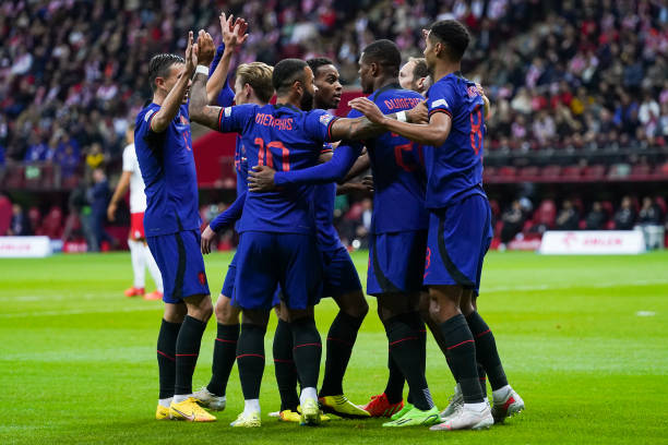 Cody Gakpo celebrates after scoring with his teammates during the Poland vs Netherlands UEFA Nations League A Group 4 match at the PGE Narodowy on September 22, 2022 in Warsaw, Poland. 